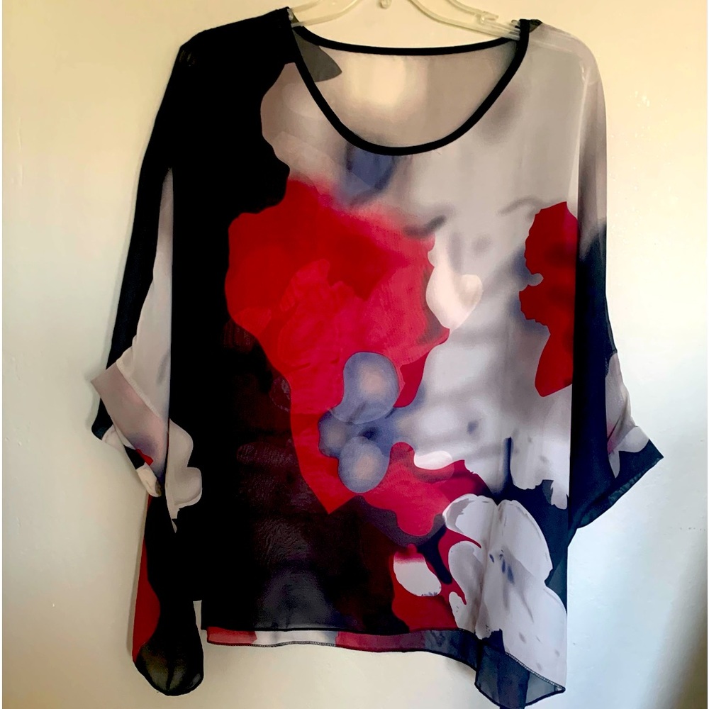 Loose sheer tunic.